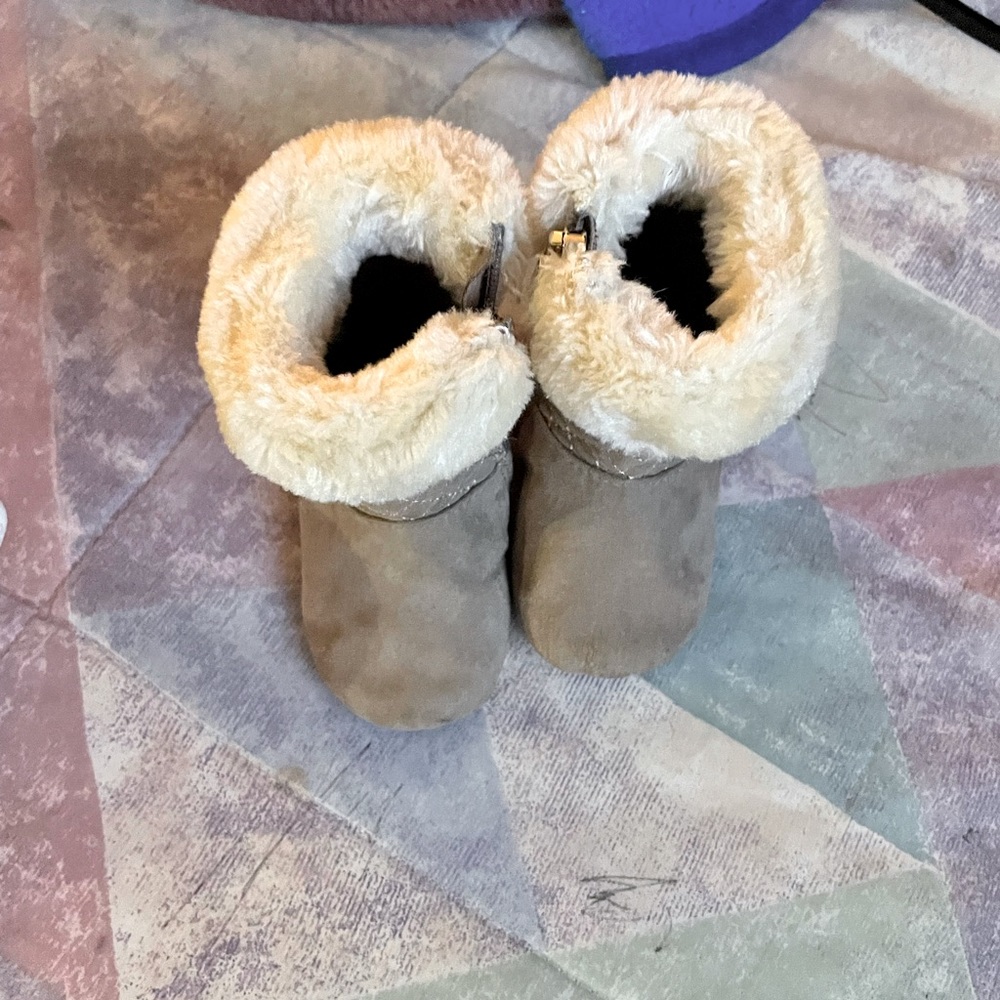 These boots are Michael Kors this was my granddaughters first pair of boots